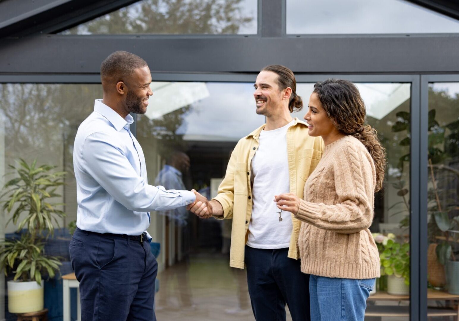 Couple meeting real estate agent
